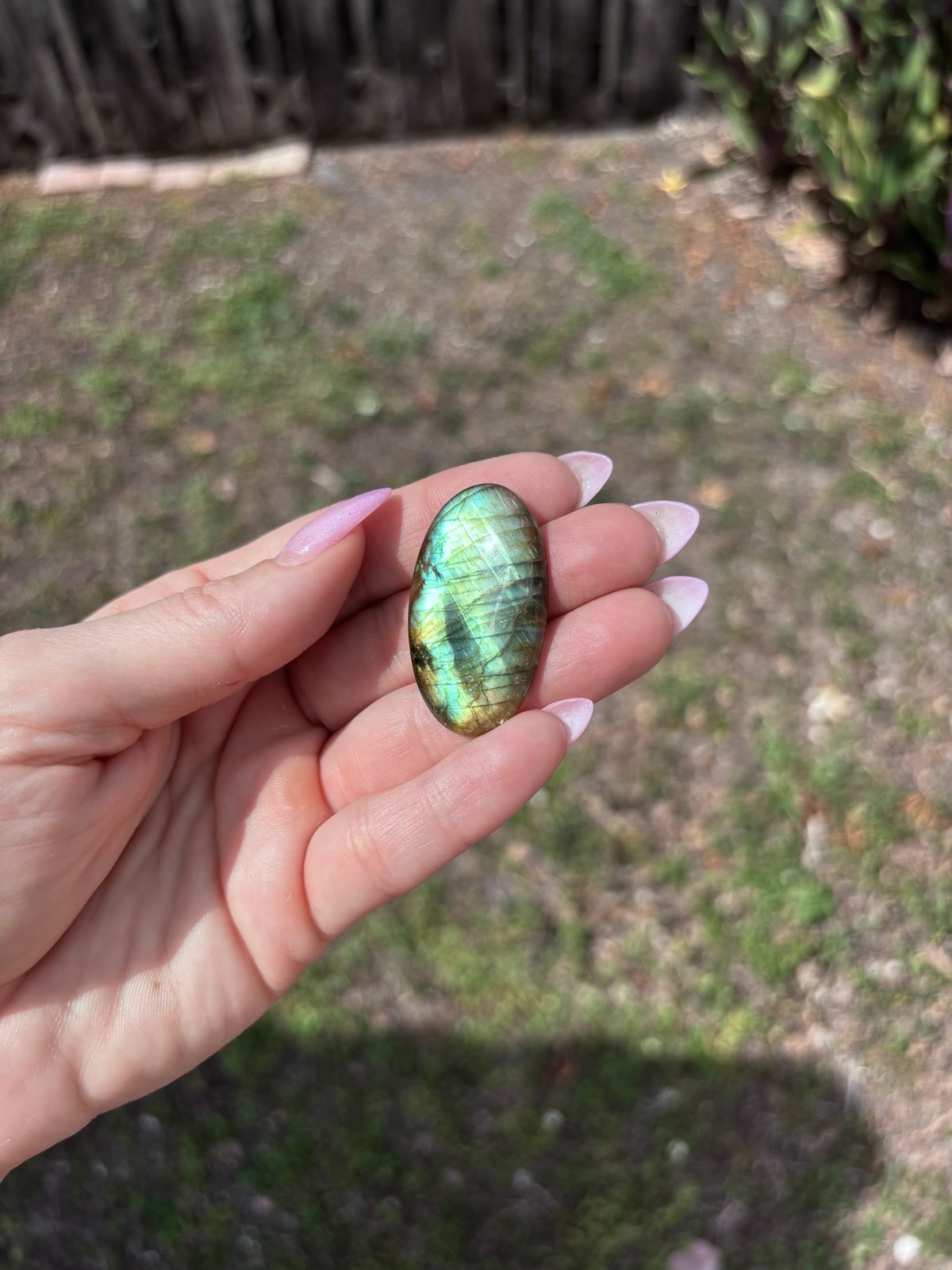 Labradorite green and yellow flash cabochon