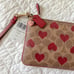 Coach Signature Heart Print Wristlet