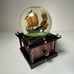 Disney Snow Globe Pirates of the Caribbean At World's End W/Key Lights Up Music