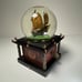 Disney Snow Globe Pirates of the Caribbean At World's End W/Key Lights Up Music