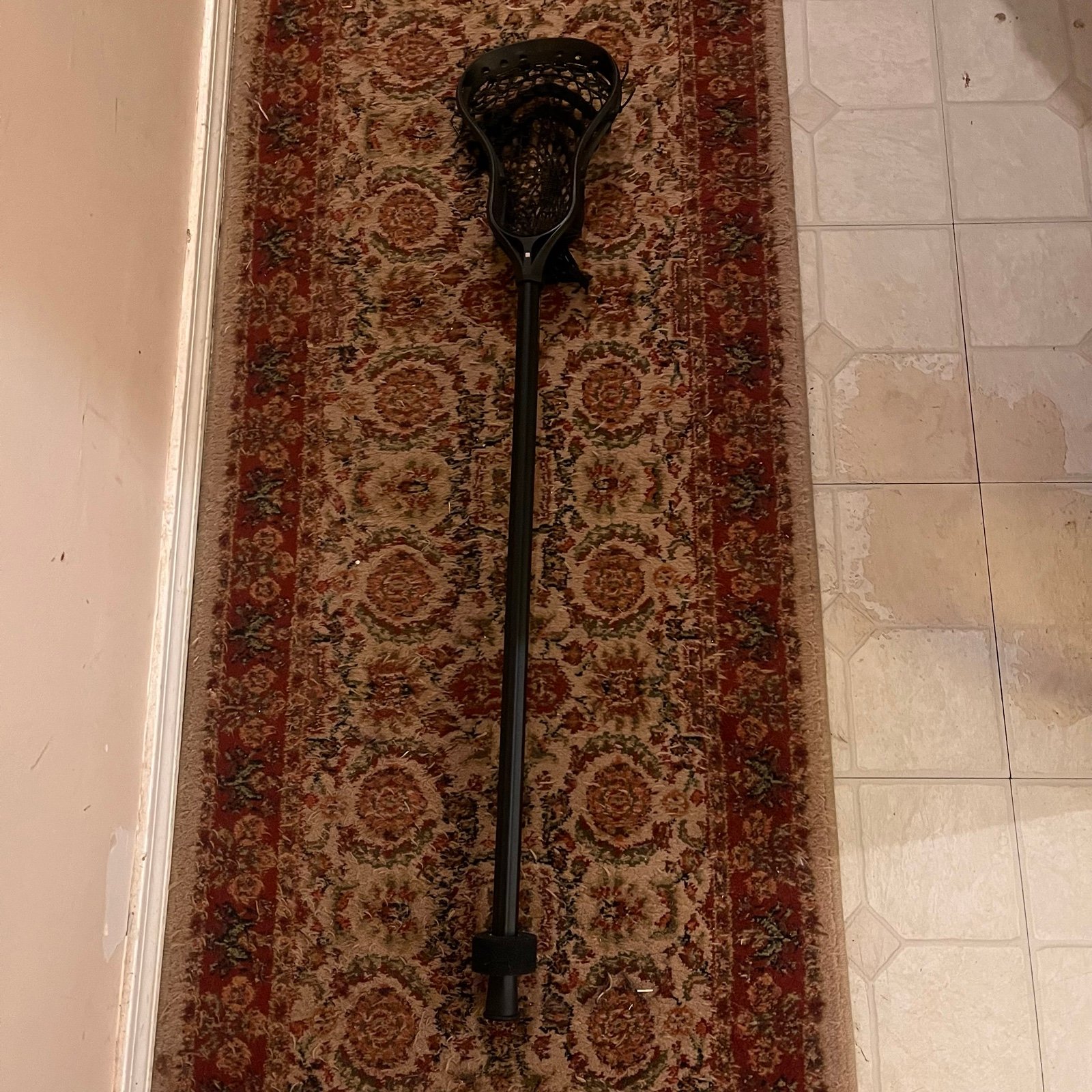 Stringking forward lacrosse stick