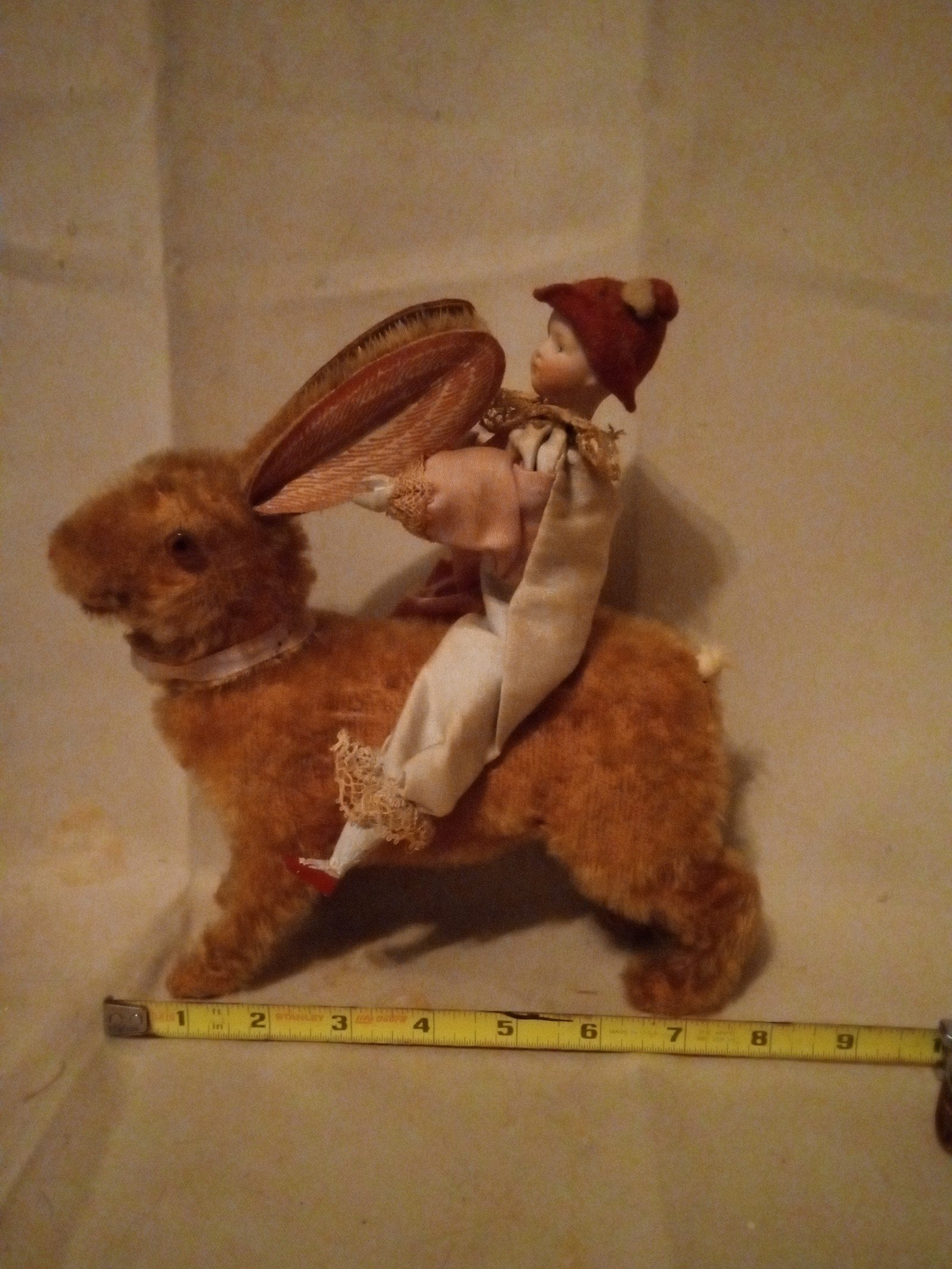 Antique bisque head boy candy container riding Rabbit