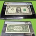 2006 1 dollar Note with low serial number 00000257