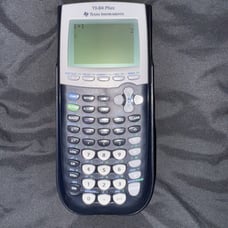 Texas Instruments TI-84 Plus Graphics Calculator W/ Back case