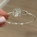 Sterling silver sand dollar hing bangle bracelet