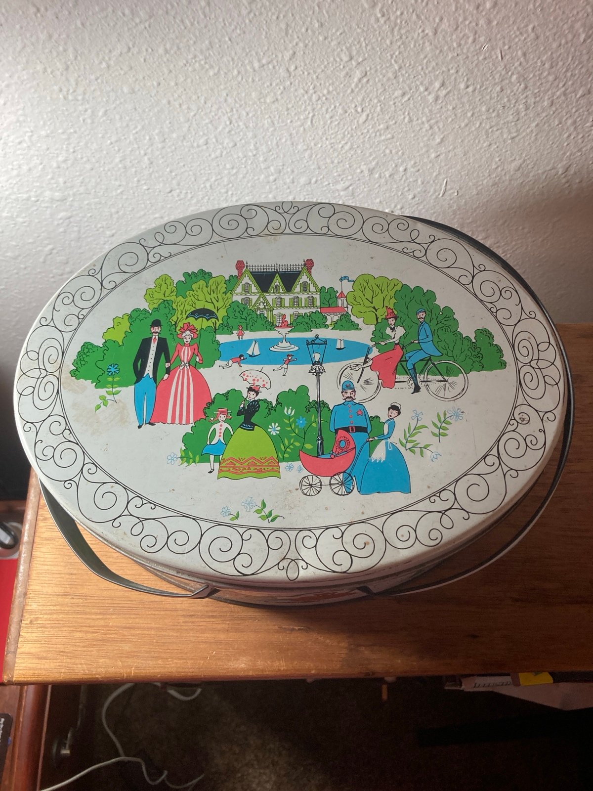 Vintage oval tin box with handles