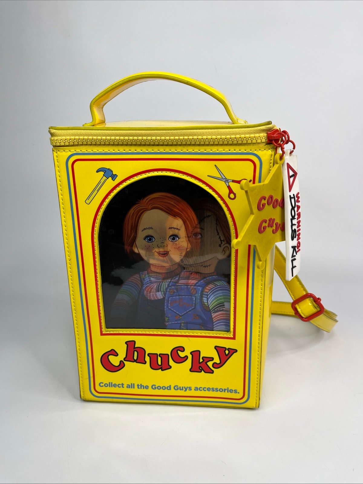 DOLLS KILL - Fun Time Chucky Bag This backpack has a vinyl creation Toybox shape