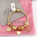 Linx Yellow Gold Snake Chain Bracelet with Registered Nurse Themed Charms