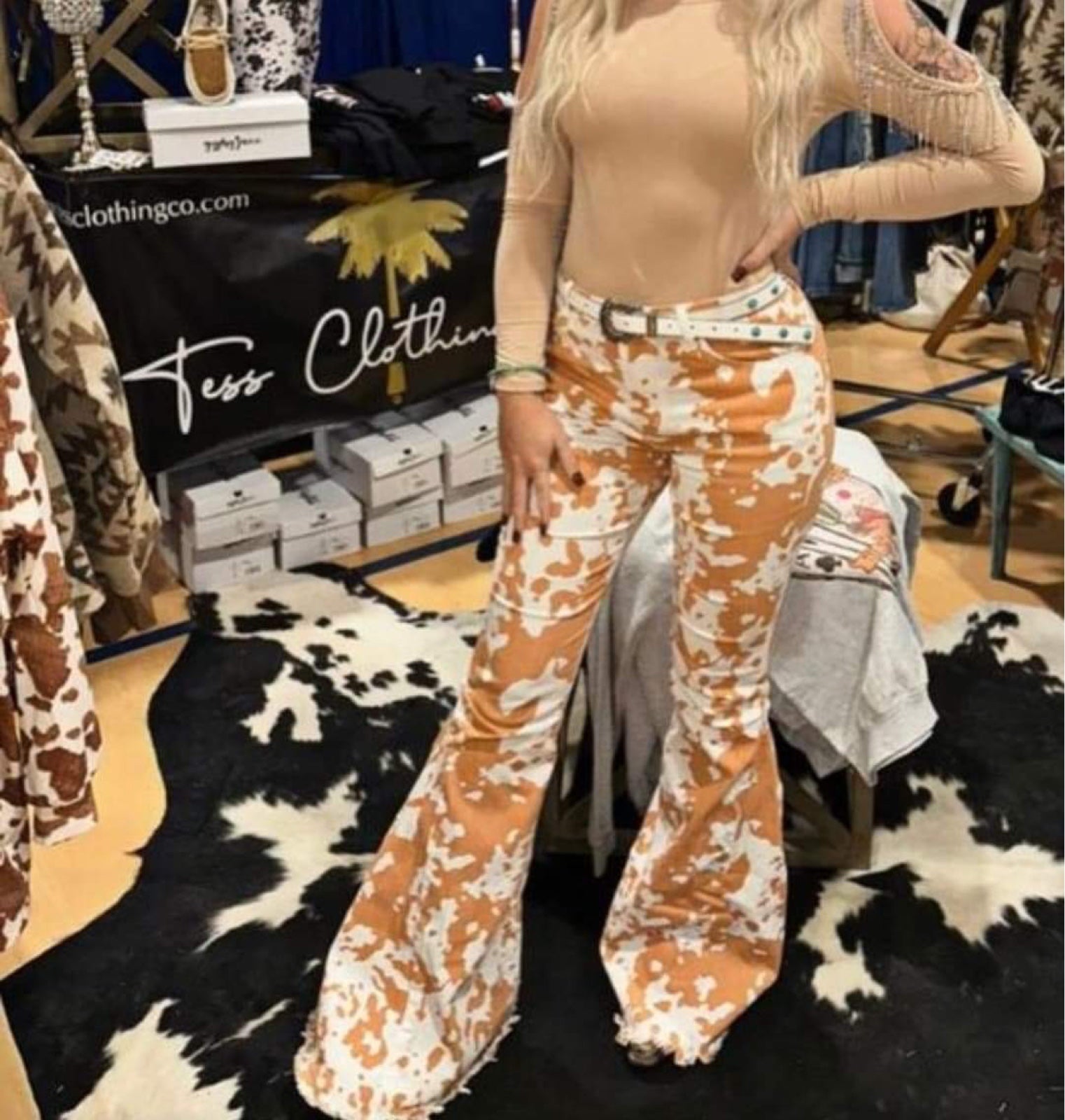 Cow print flare jeans