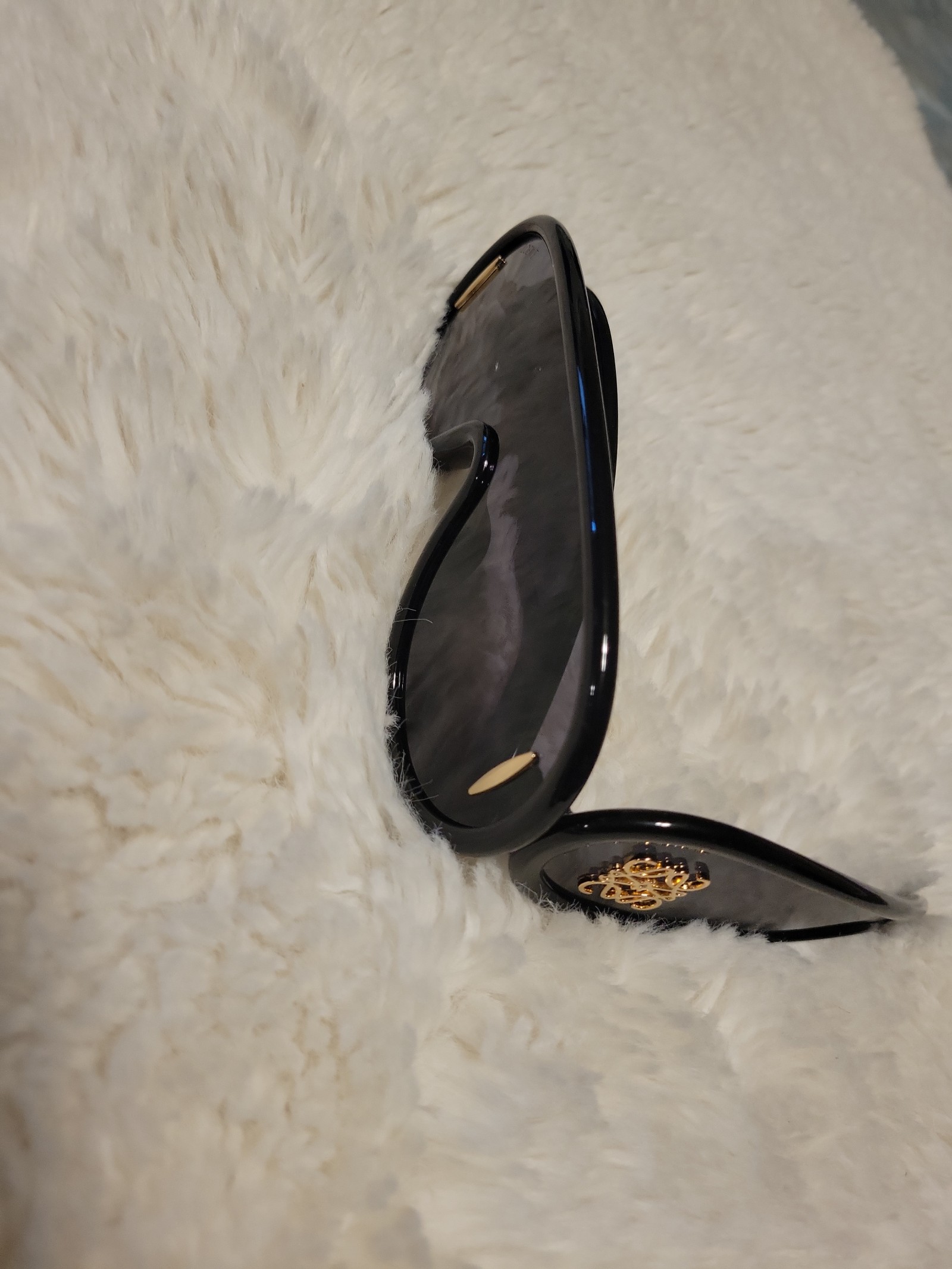 Loewe Sunglasses , black frame.