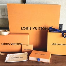 Louis Vuitton boxes, ribbon