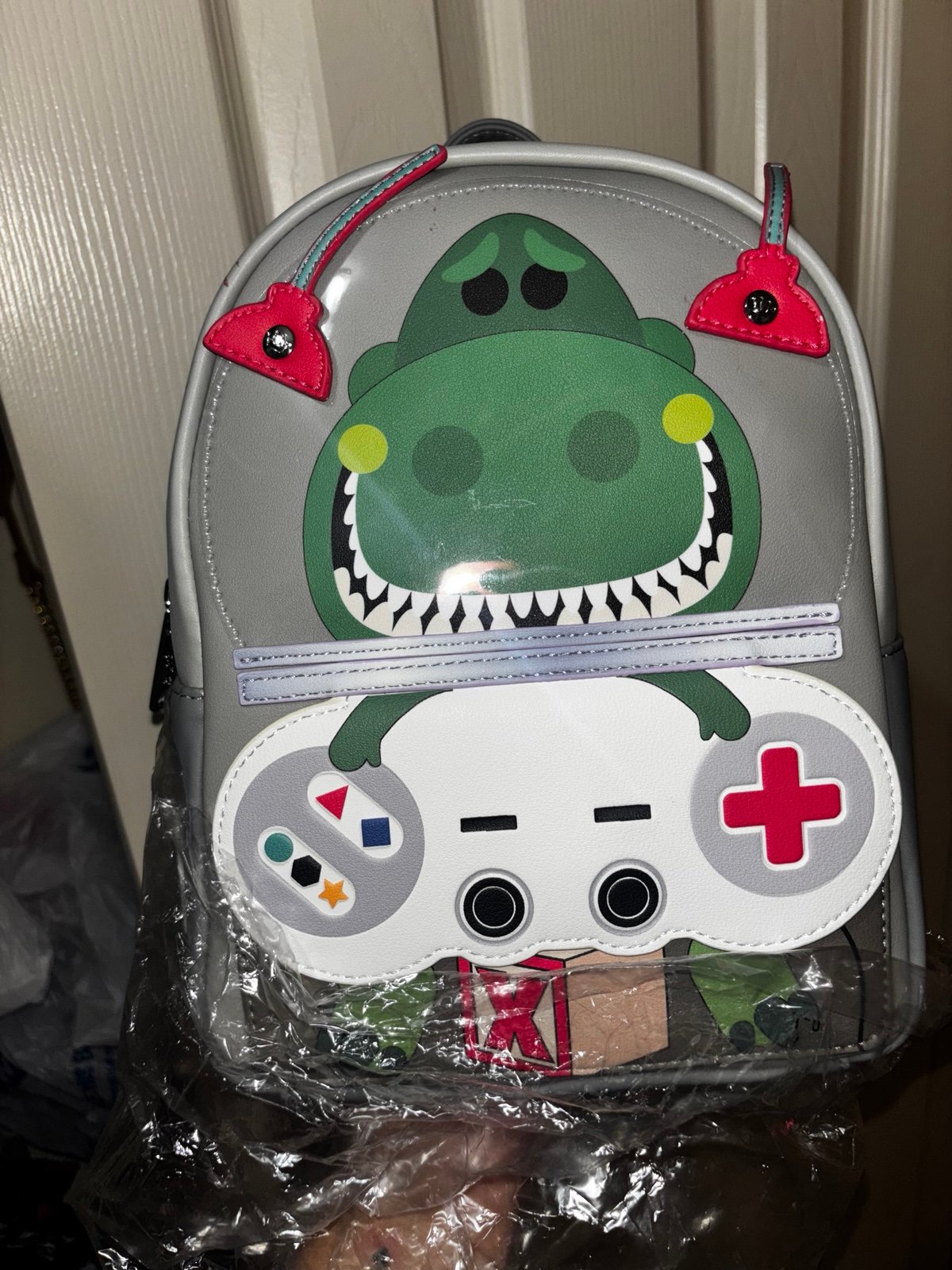 Loungefly Rex mini backpack