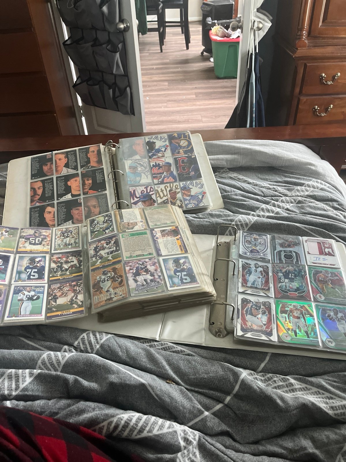 3 binders full of Baseball/Football/Basketball cards