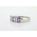 14k Tanzanite Oval and Diamond Channel Anniversary ring. Channel set eternity b