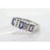 14k Tanzanite Oval and Diamond Channel Anniversary ring. Channel set eternity b