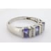 14k Tanzanite Oval and Diamond Channel Anniversary ring. Channel set eternity b