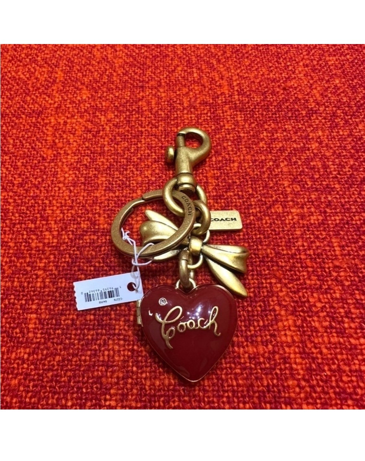 Coach heart/bow purse charm