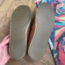 Men’s Tom’s leather slip ons.