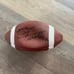 GUS FREROTTE #12 AUTOGRAPHED WILSON FOOTBALL