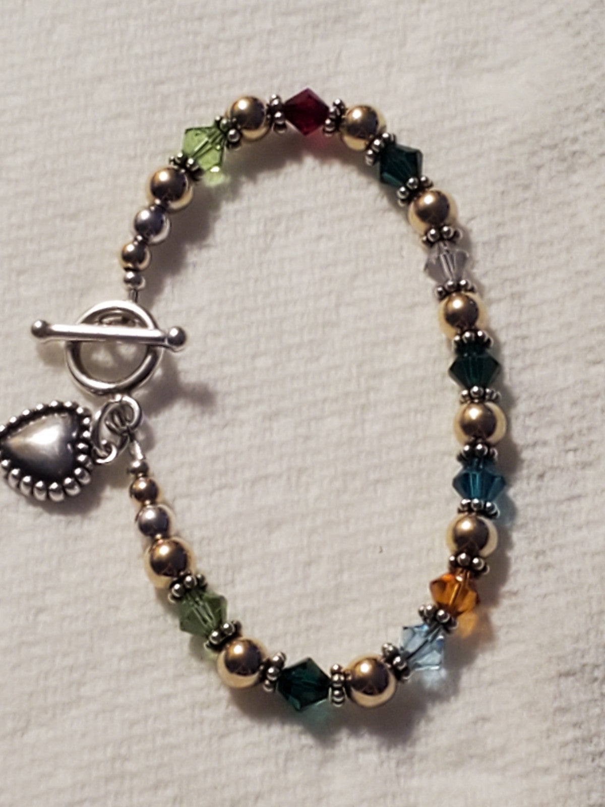 Sterling silver and gold beaded bracelet with heart charm