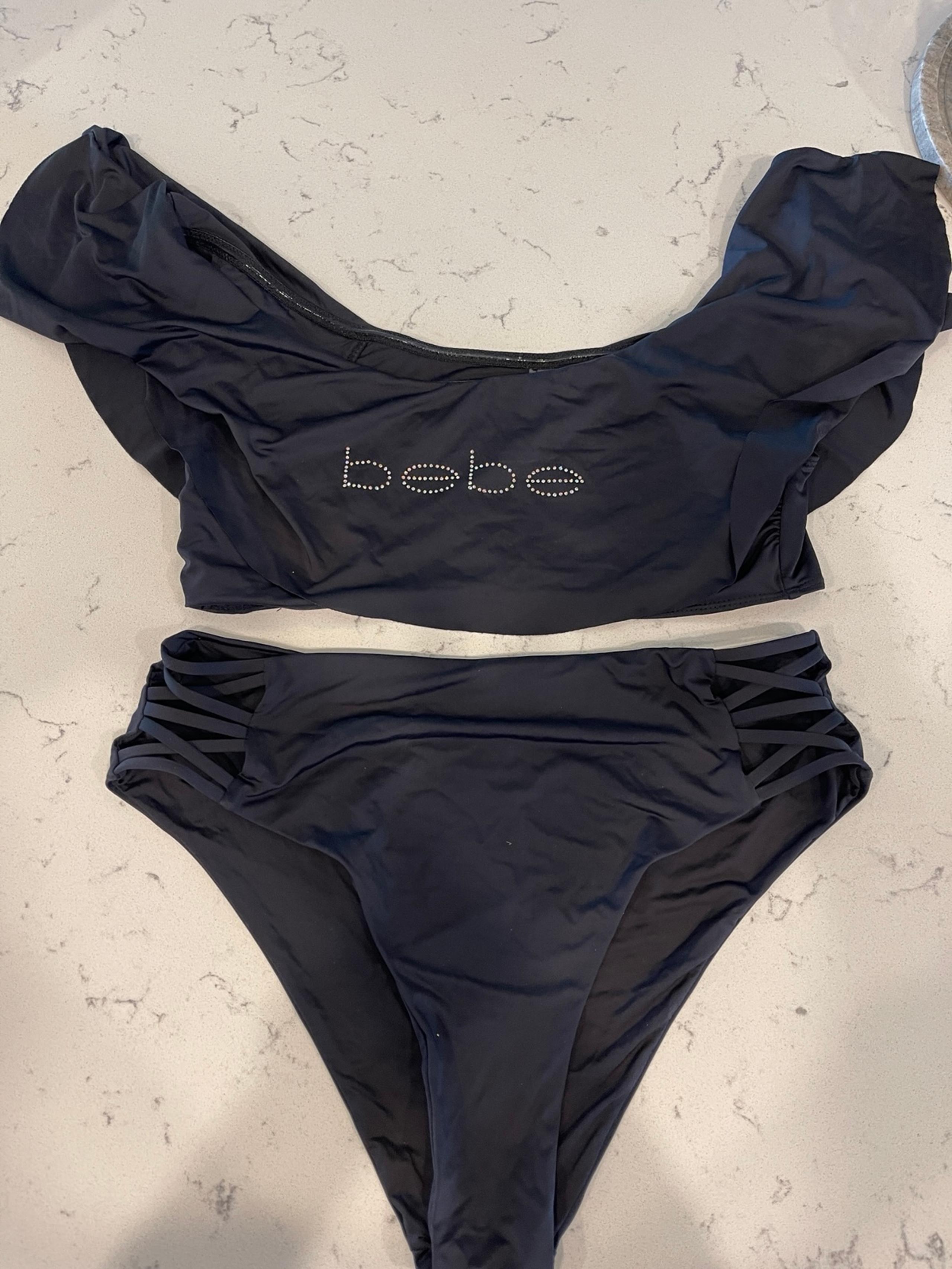 Bebe woman’s bathing suit  size LARGE