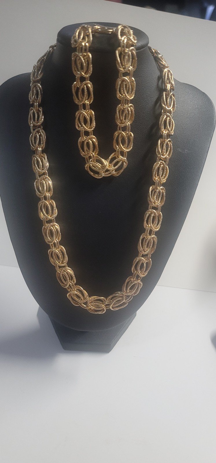S18  Textured and Polished Multi Oval Link Necklace and Bracelet.