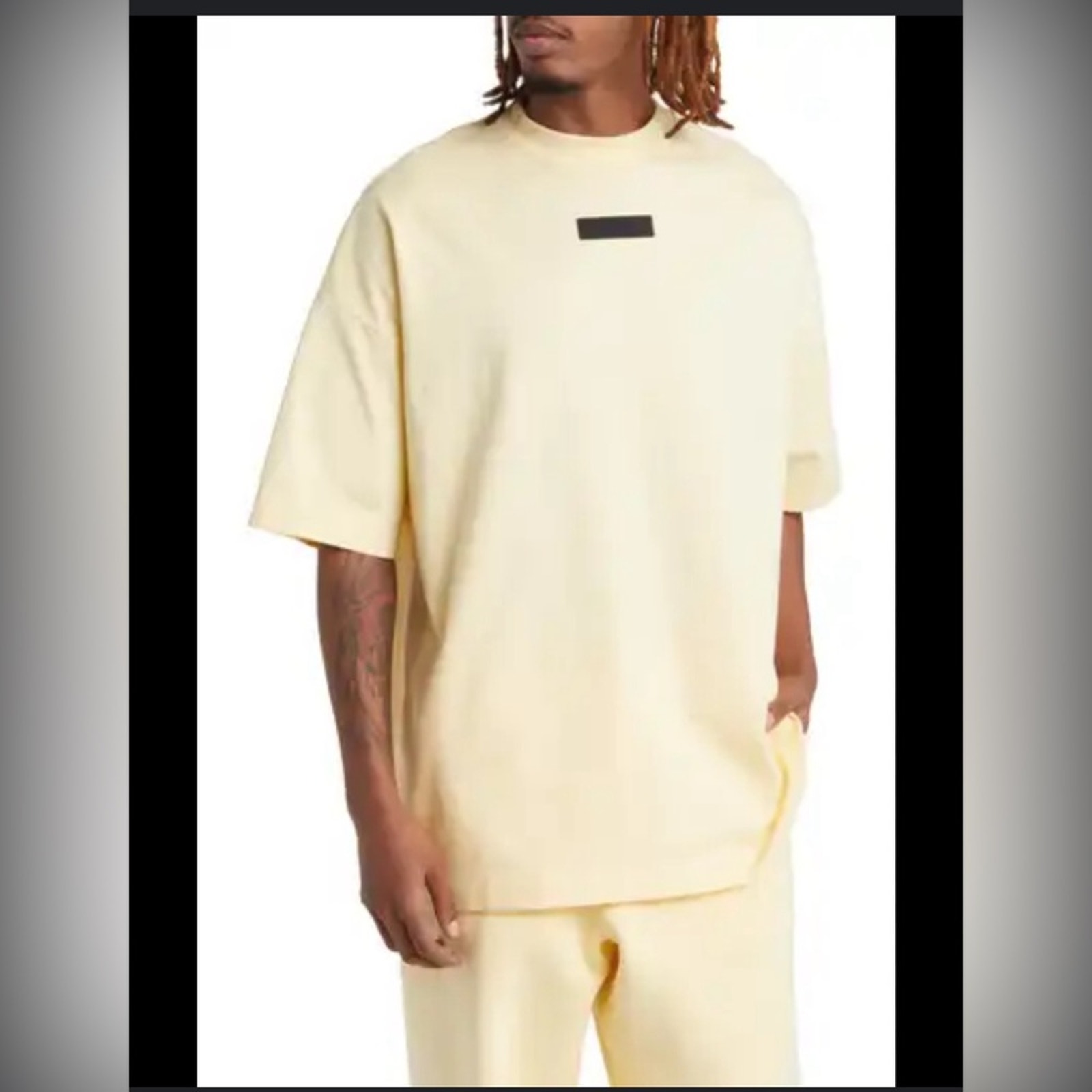 FEAR OF GOD ESSENTIAL Slogo appliqué cotton T-Shirt Yellow L