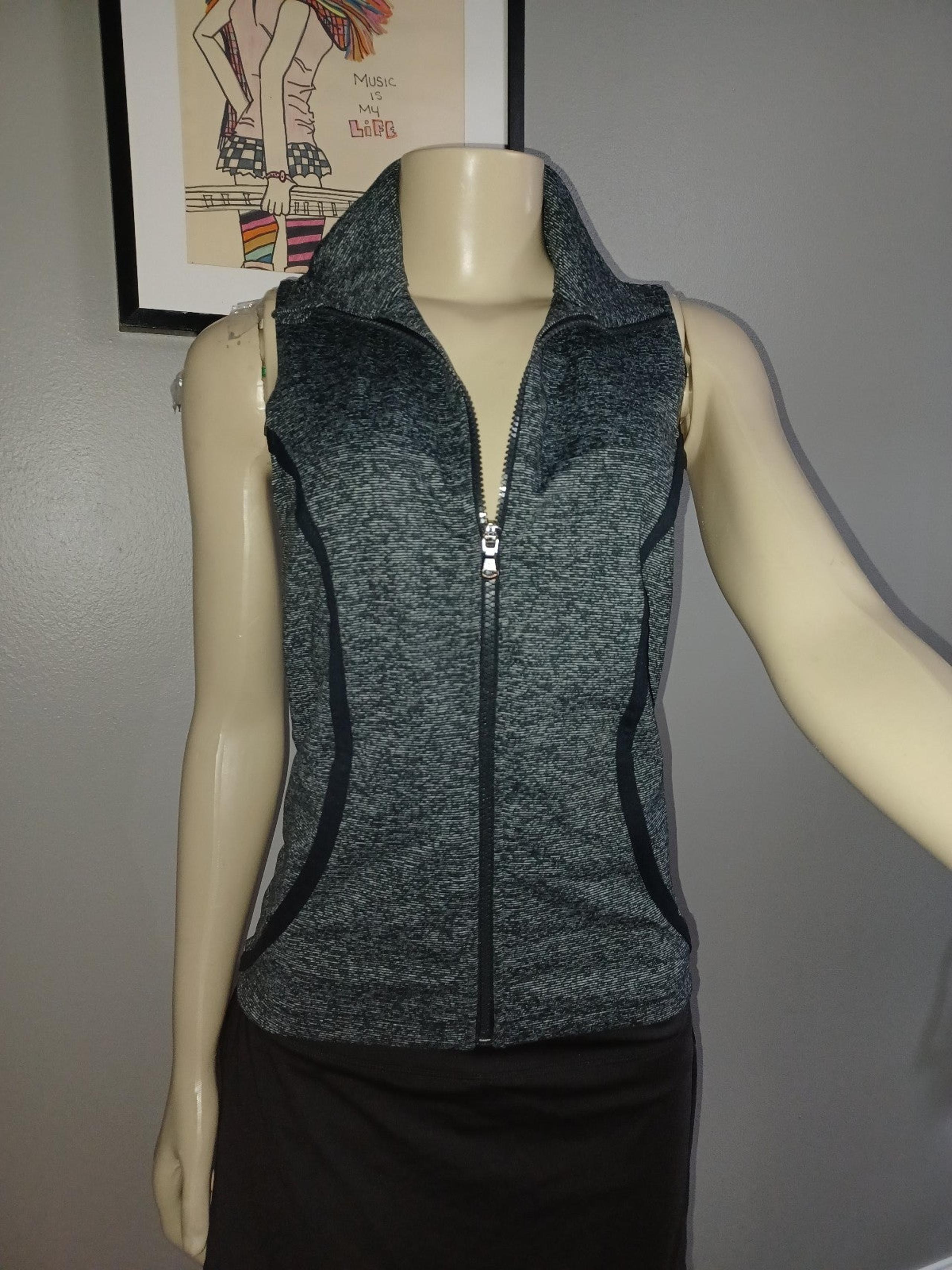 Under Armour Women's Fitted Stretch Full Zip Vest with front slash pockets