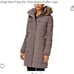 Long puffer trim hooded with a perfume
