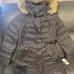 Long puffer trim hooded with a perfume