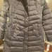 Long puffer trim hooded with a perfume