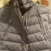Long puffer trim hooded with a perfume