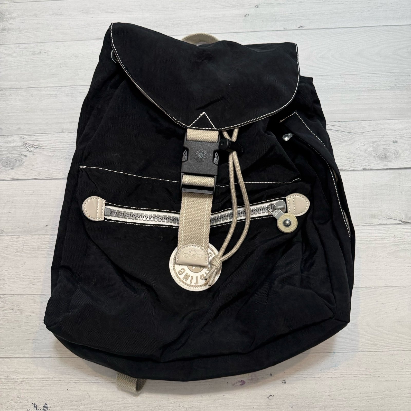 Kipling black buckle drawstring nylon backpack