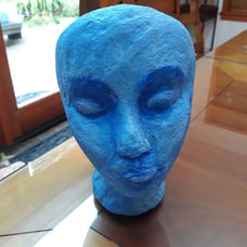 Hand made blue head planter.