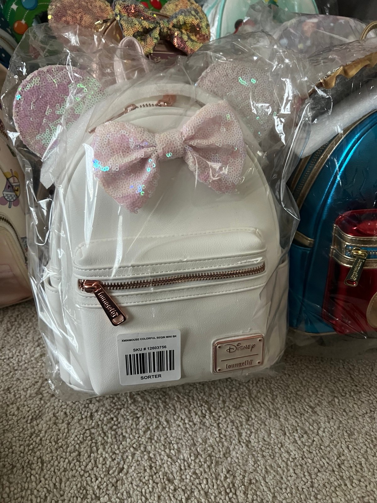 Loungefly Pink and White Backpack