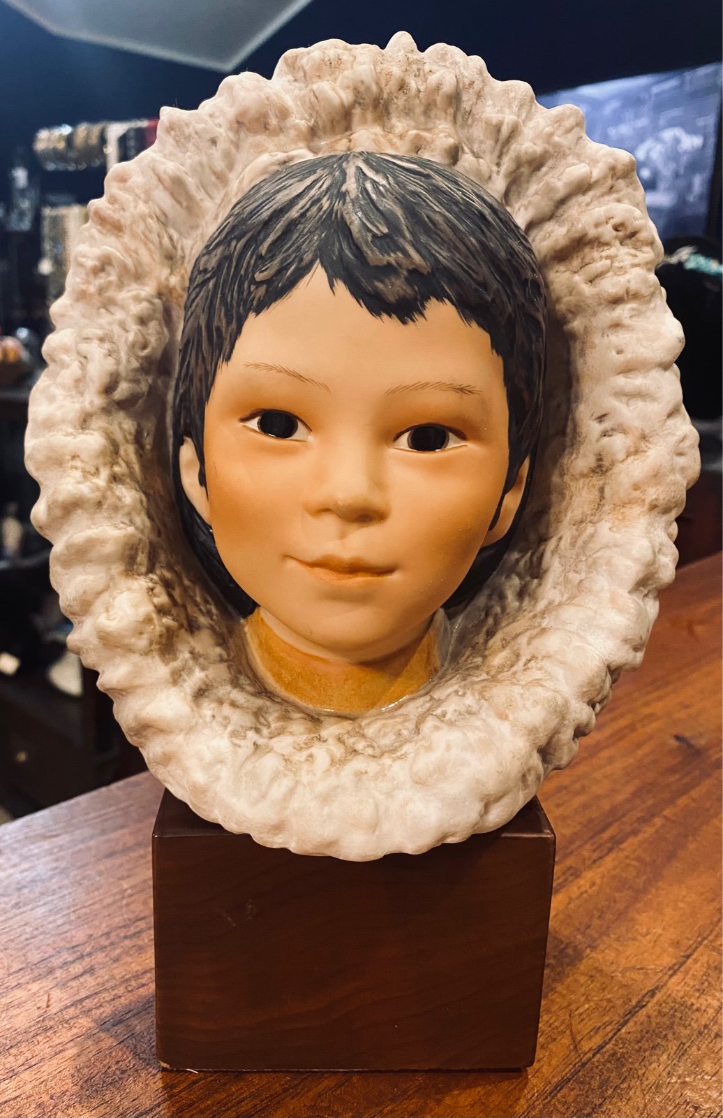 Signed Cybis Porcelain “Eskimo Child with Snow Bunting” Statue that is hand-pain