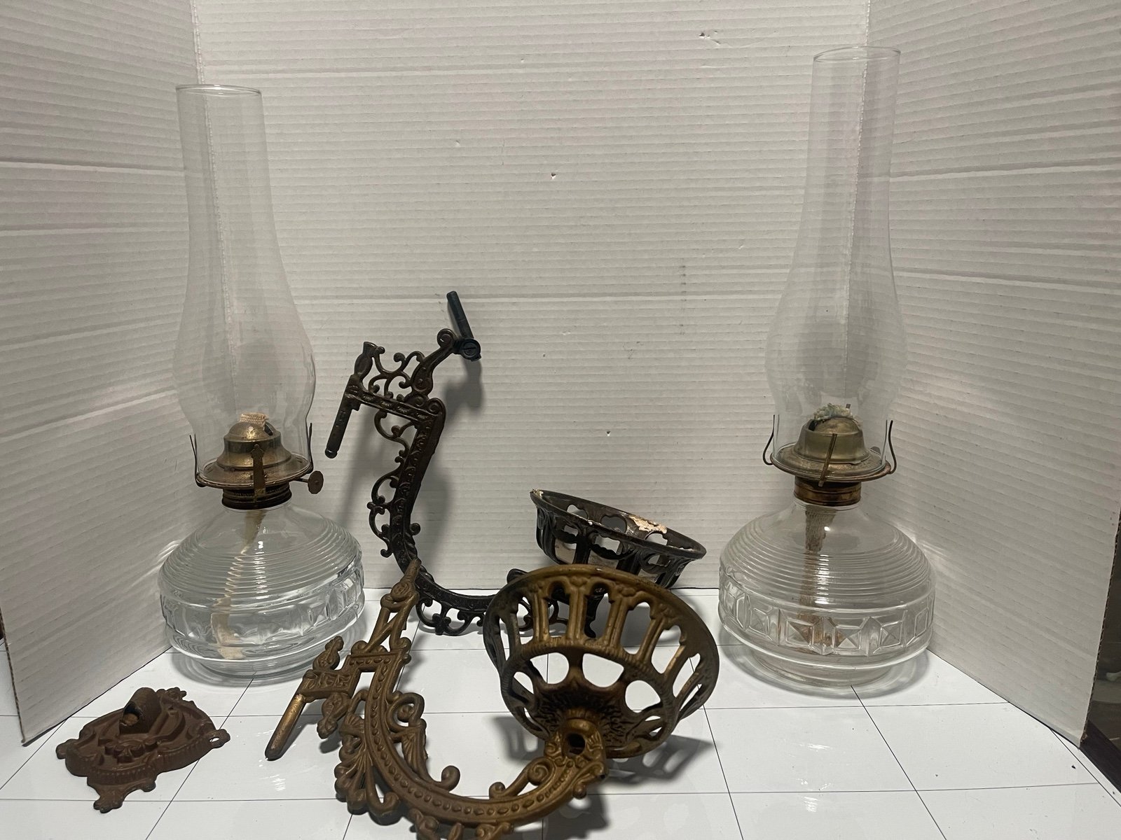 2 kerosene oil lamps with cast iron swinging holder and bracket