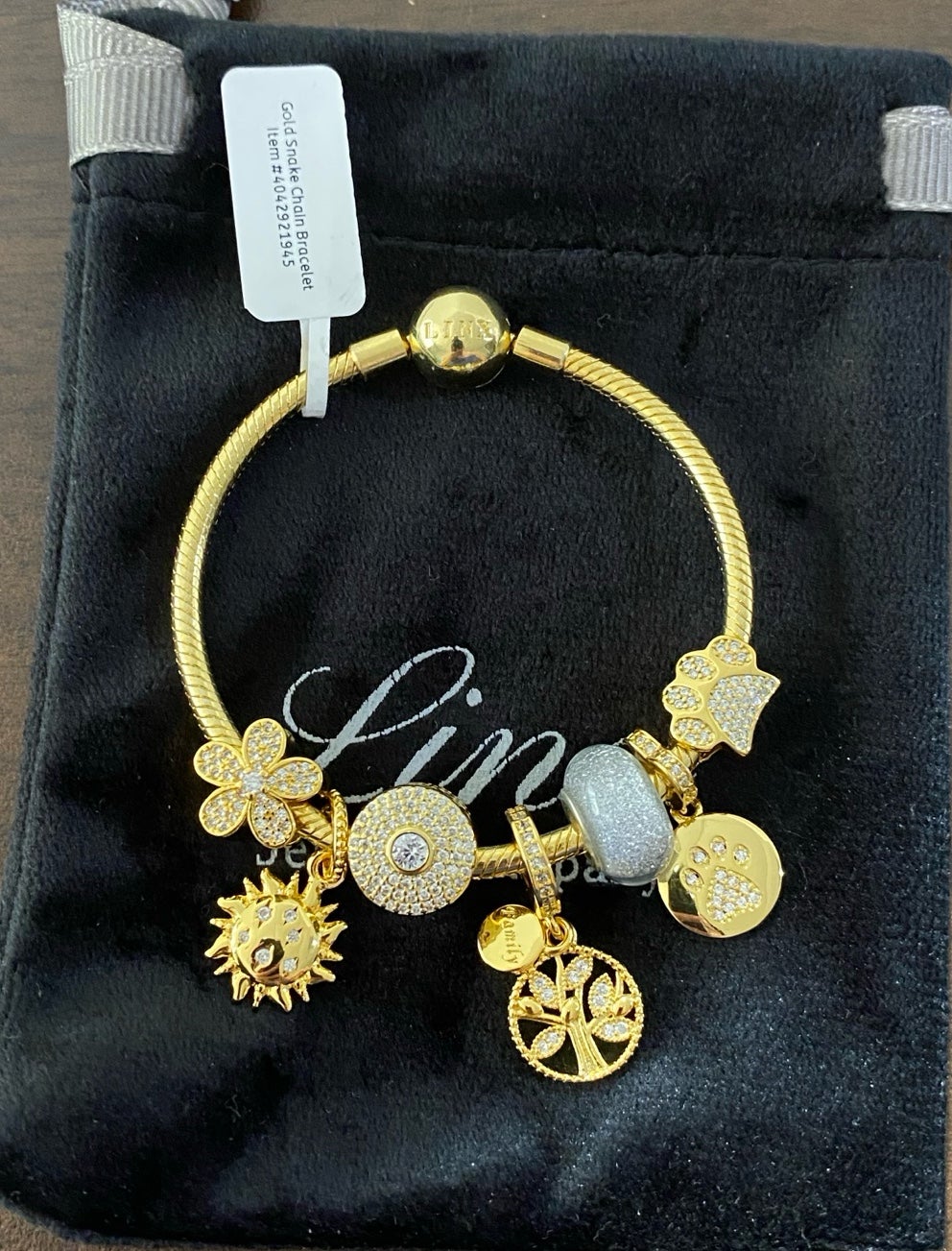 Linx Gold Snake Chain Bracelet with Gold and Zircon Themed Charms