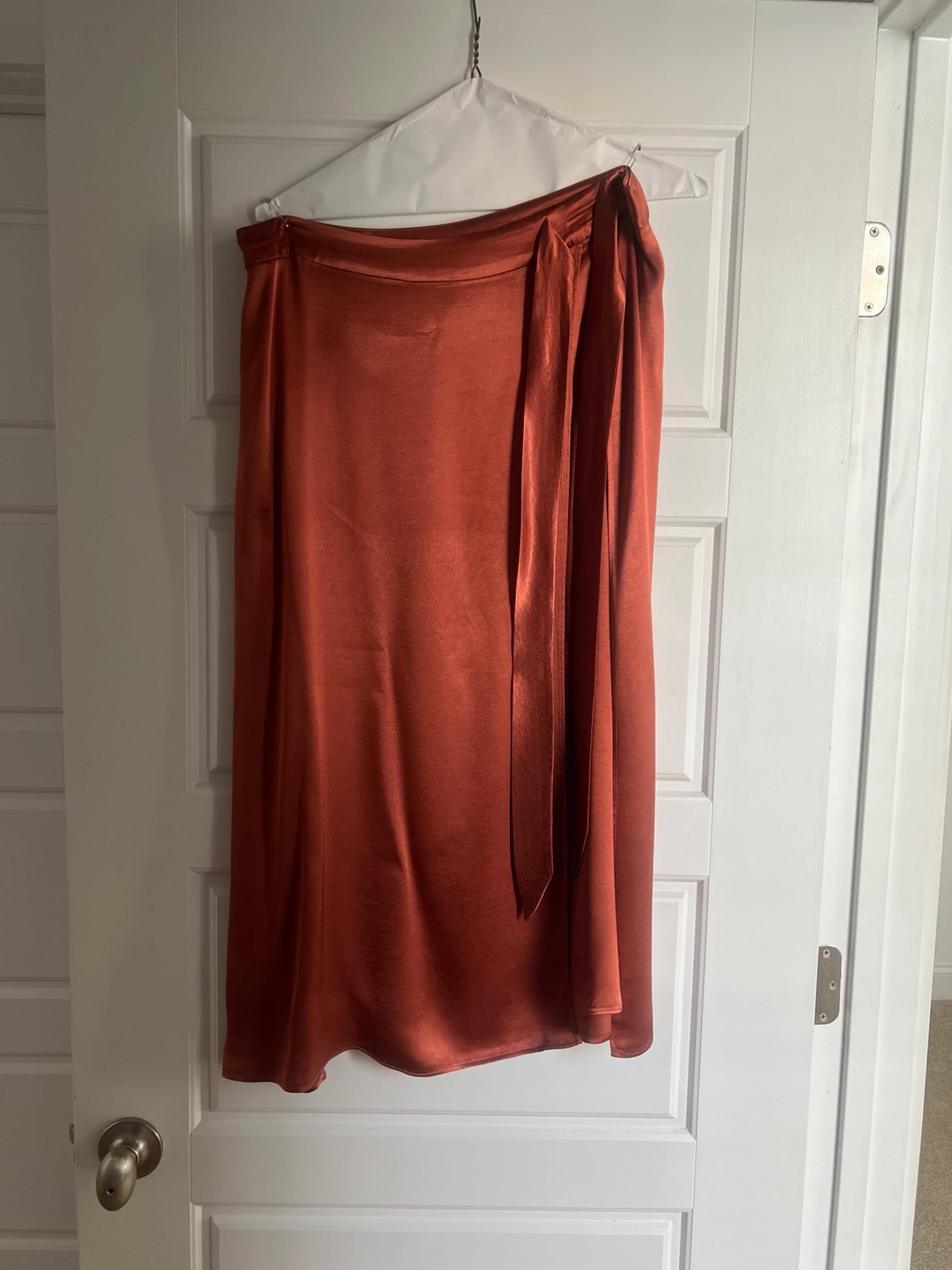 NWOT H&M burnt orange rust satin type wrap tie midi skirt size 12.