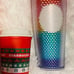 Starbucks pride tumbler and holiday cup.