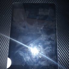 Apple ipad mini (locked Sim)