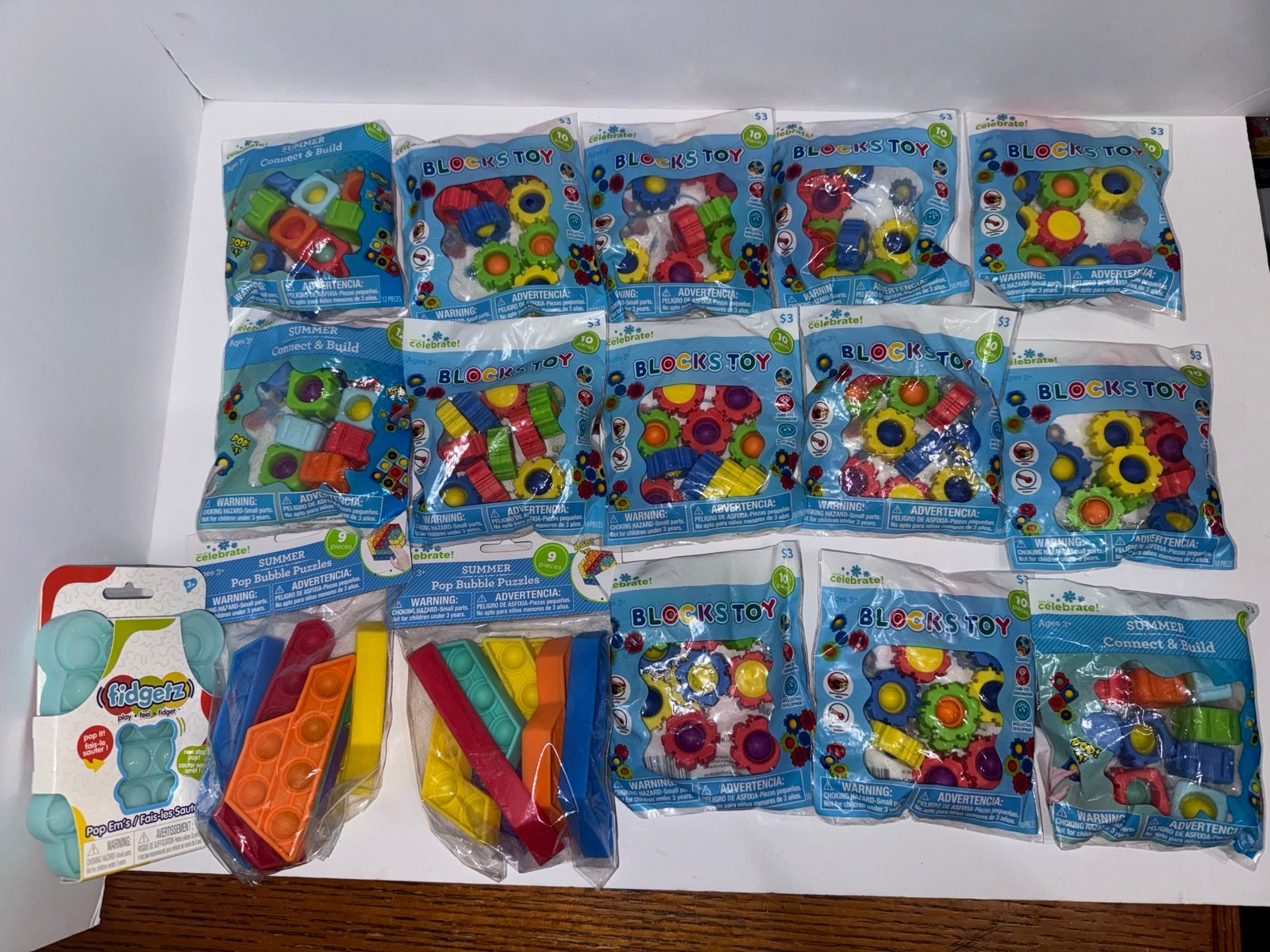 Fidget toy bundle of black toys, pop it bubble puzzles and a pop it.