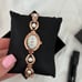 Women's Gold and White Watch