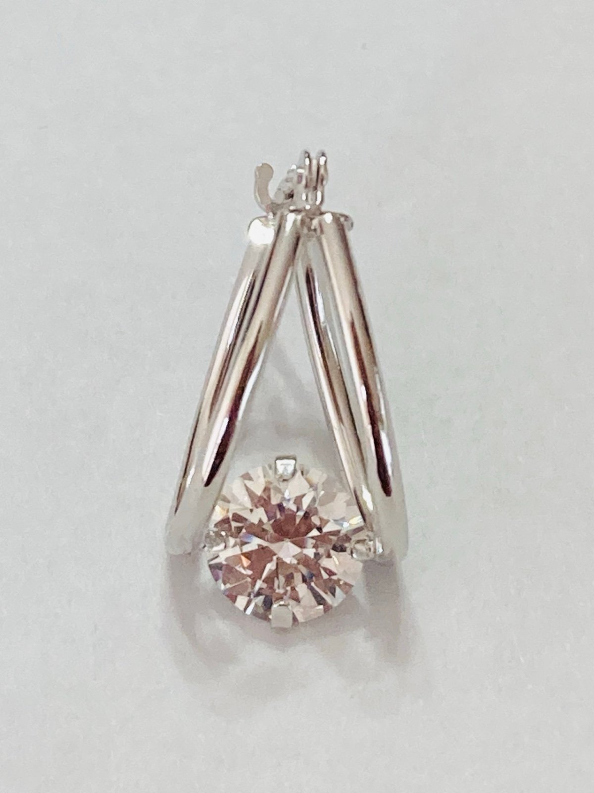 Single JCM 14kt white gold 6mm cz hoop earring