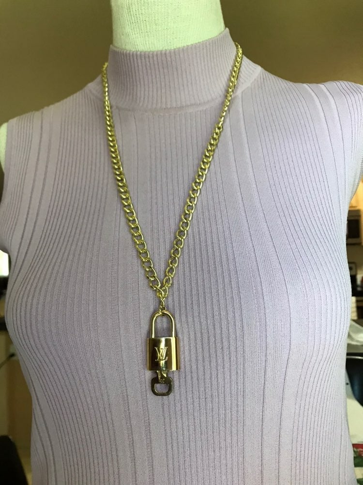authentic Louis Vuitton lock and key