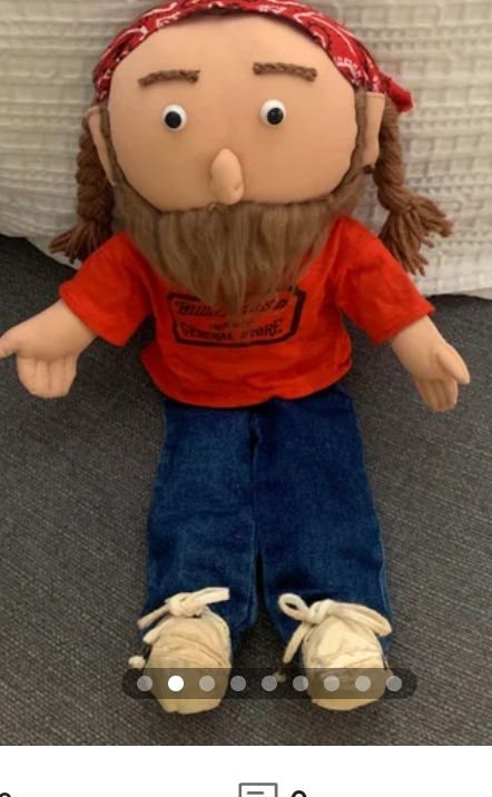 Willie Nelson signed autographed doll.1995