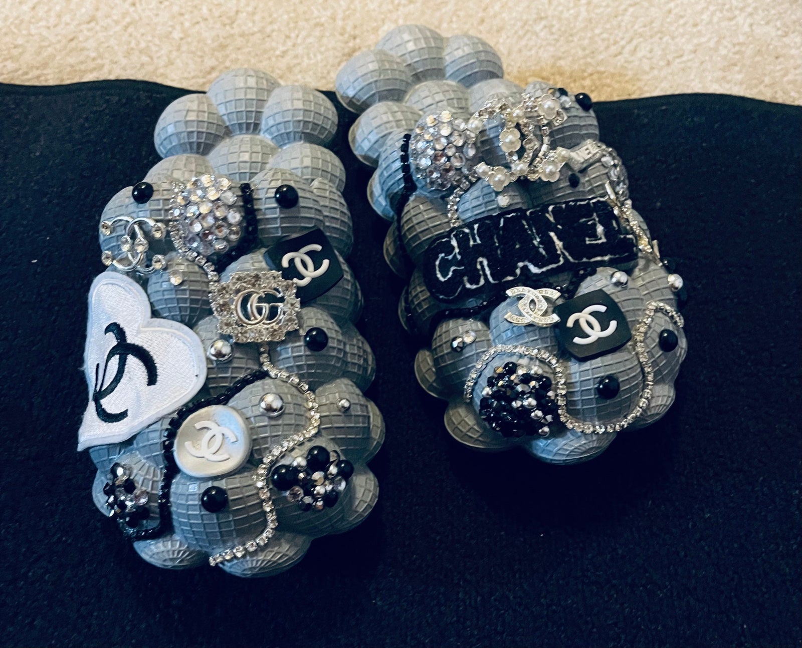 Grey bubble slides with charms