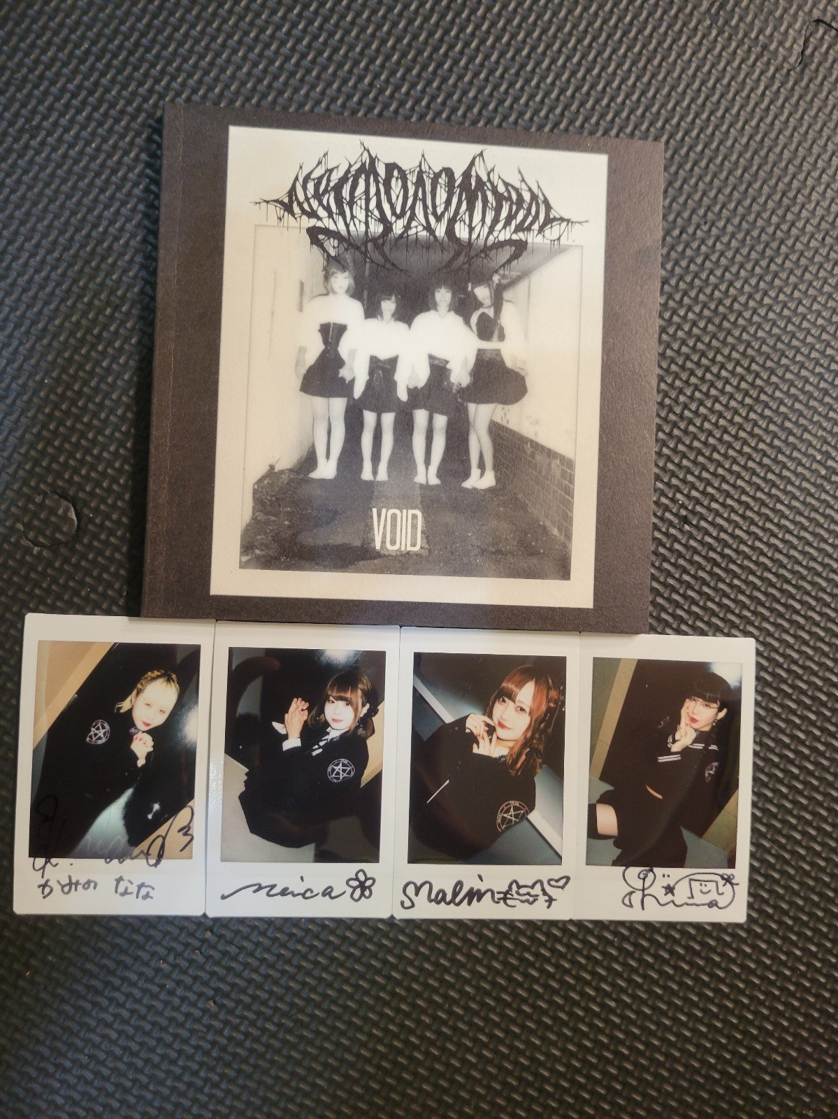 Necronomidol Vintage photo book and signed cheki of all band members.