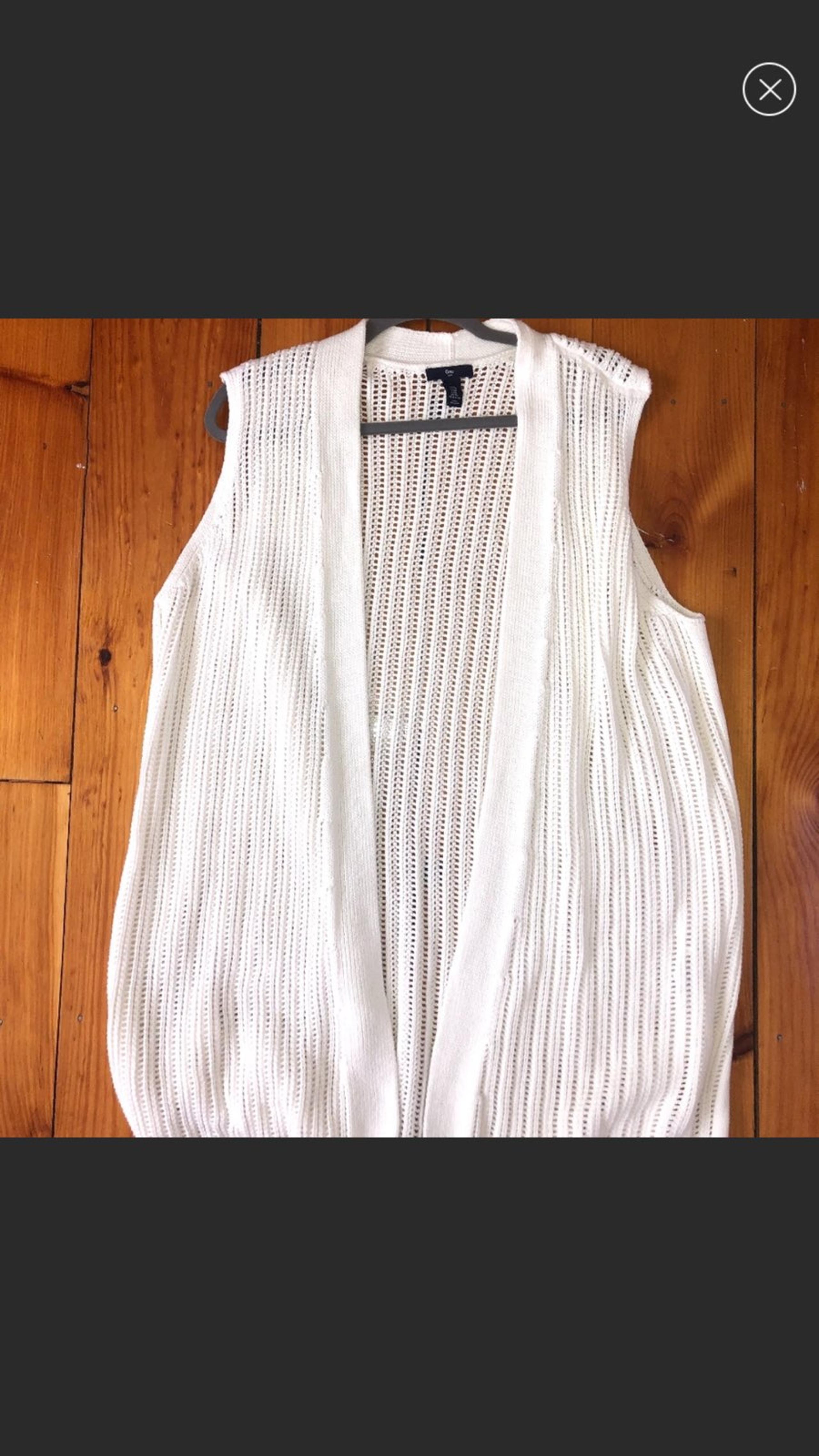 white sweater vest
