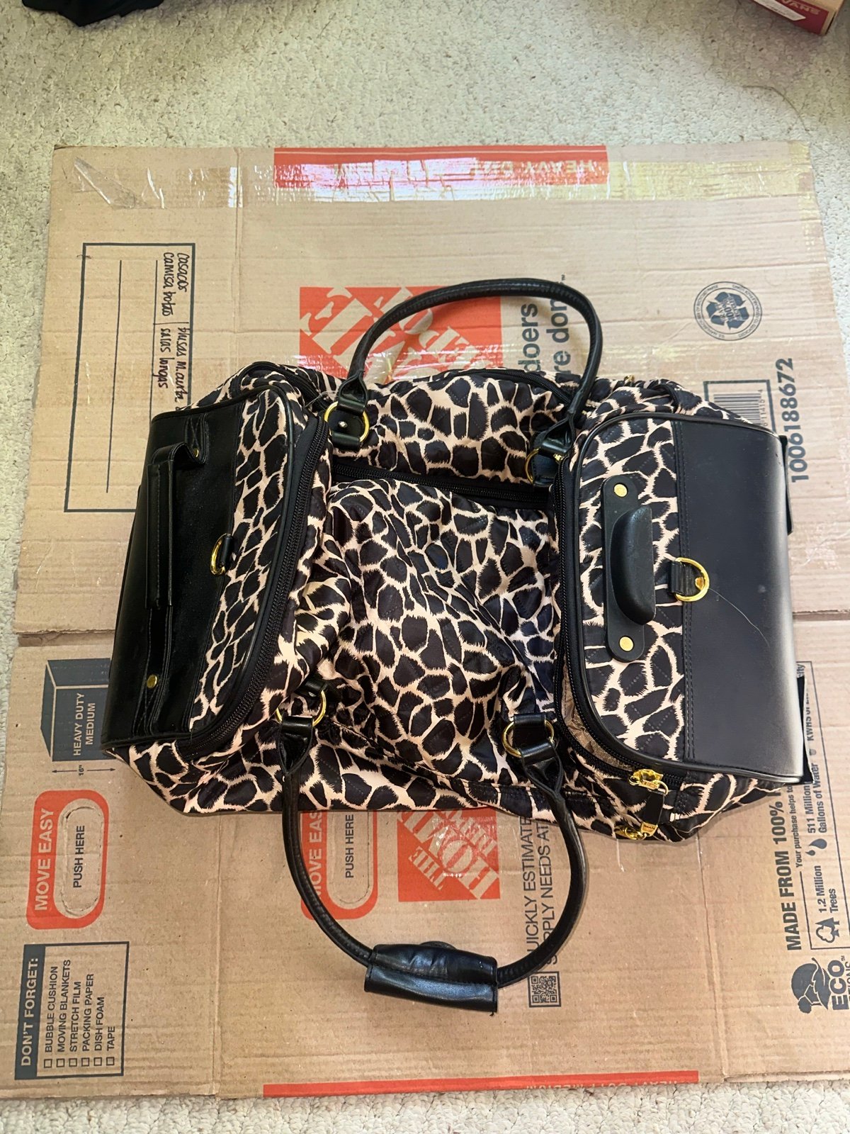 Iman Rolling duffle bag, 12x12x22in